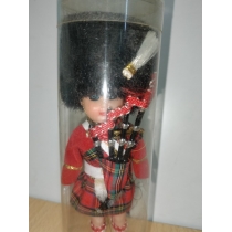 Коллекционная кукла  ( высота  13 см, общая 15 см) 